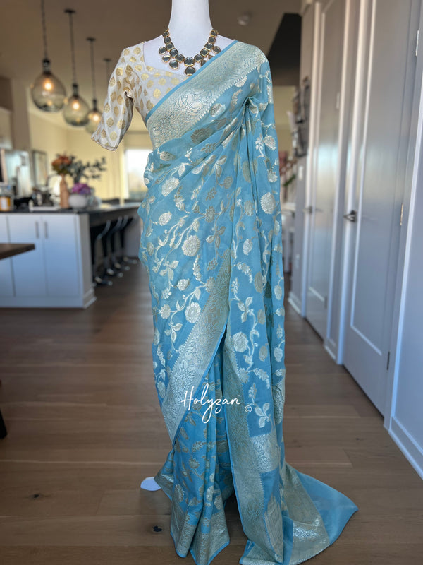Pastel Blue Banarasi Khaddi Georgette Silver Zari Saree With Blouse Piece